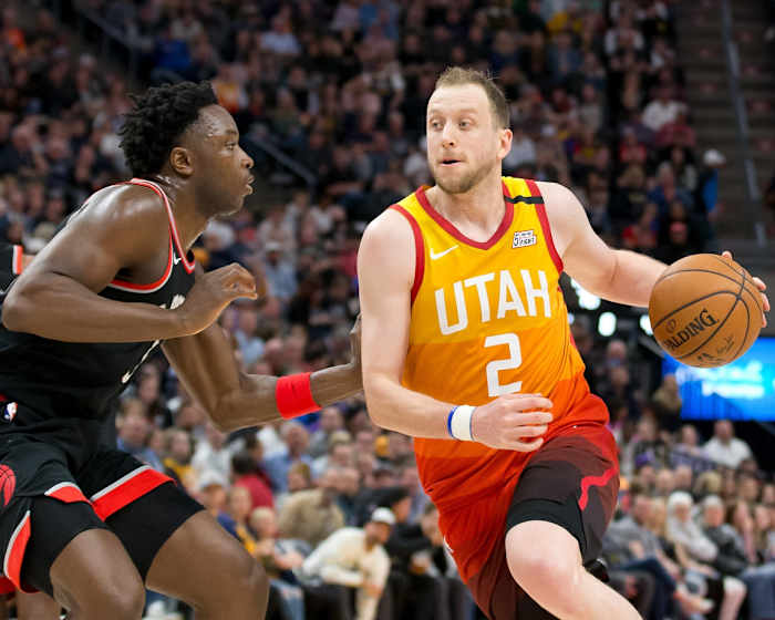 Joe Ingles (2) drives through the lane against the Toronto Raptors